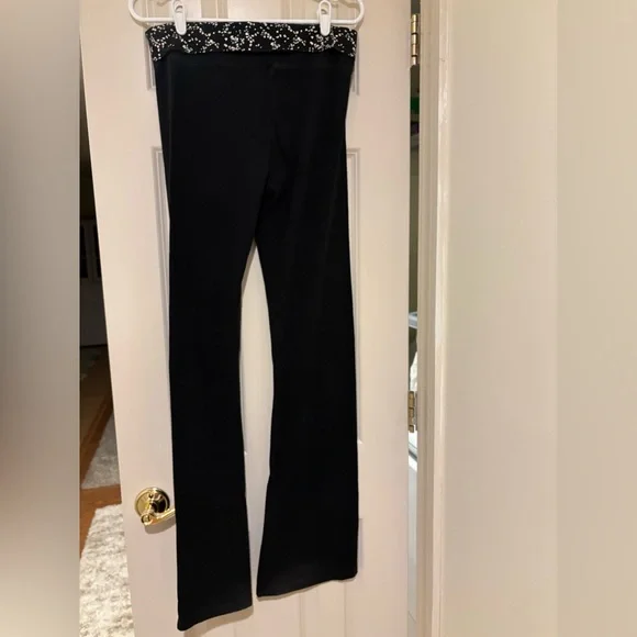 PINK Victoria’s Secret Black Flared Yoga Pants with Floral Waistband - Picture 2 of 4